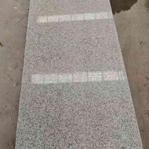 潍坊芝麻白光面毛板